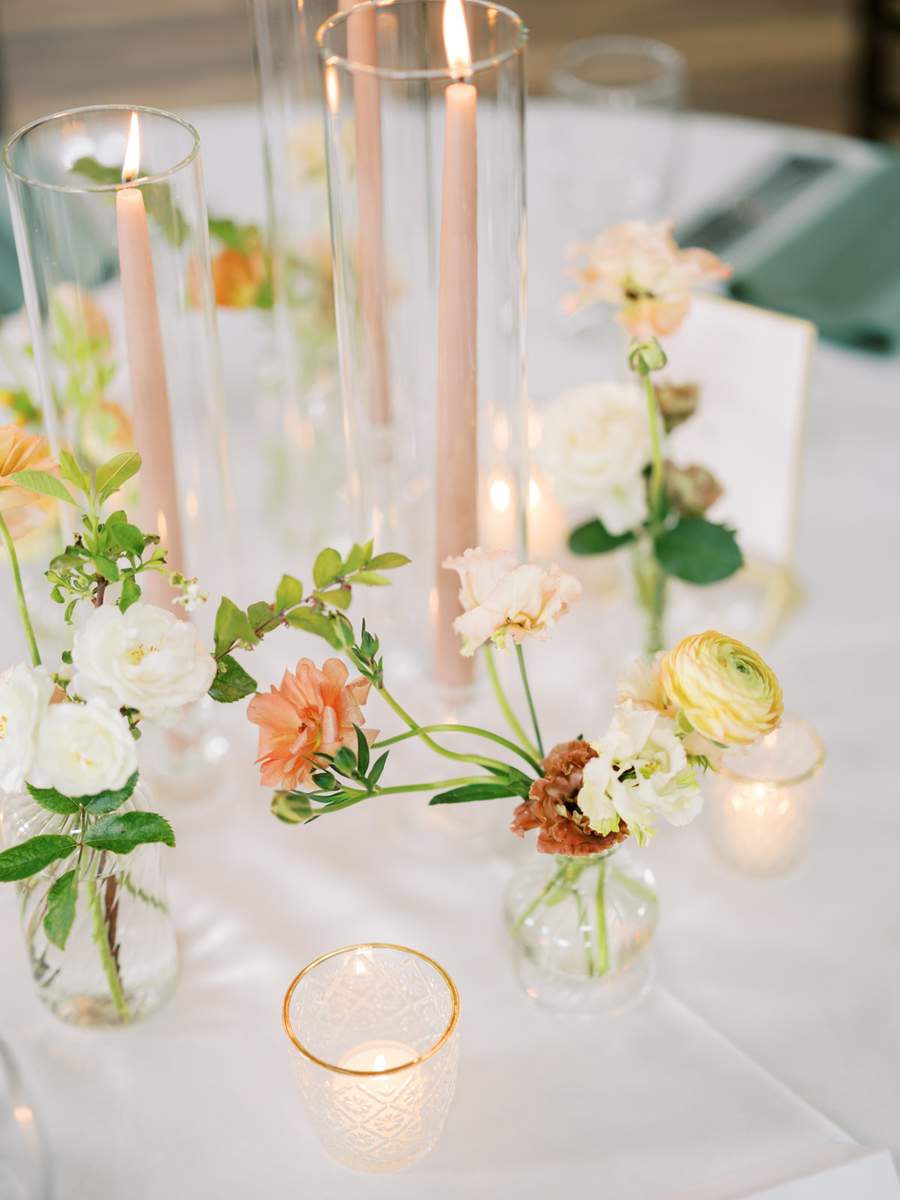 Hurricane glass tapers and gold rim tealight holders